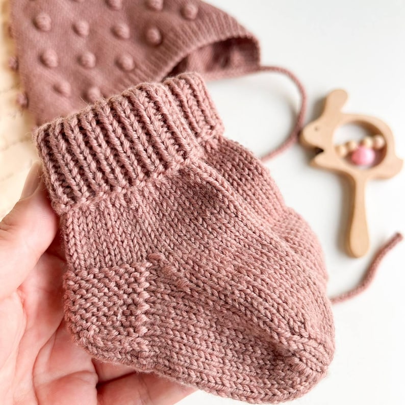 Knit Merino Wool Baby Outfit: Bonnet, Socks & Wooden Rattle